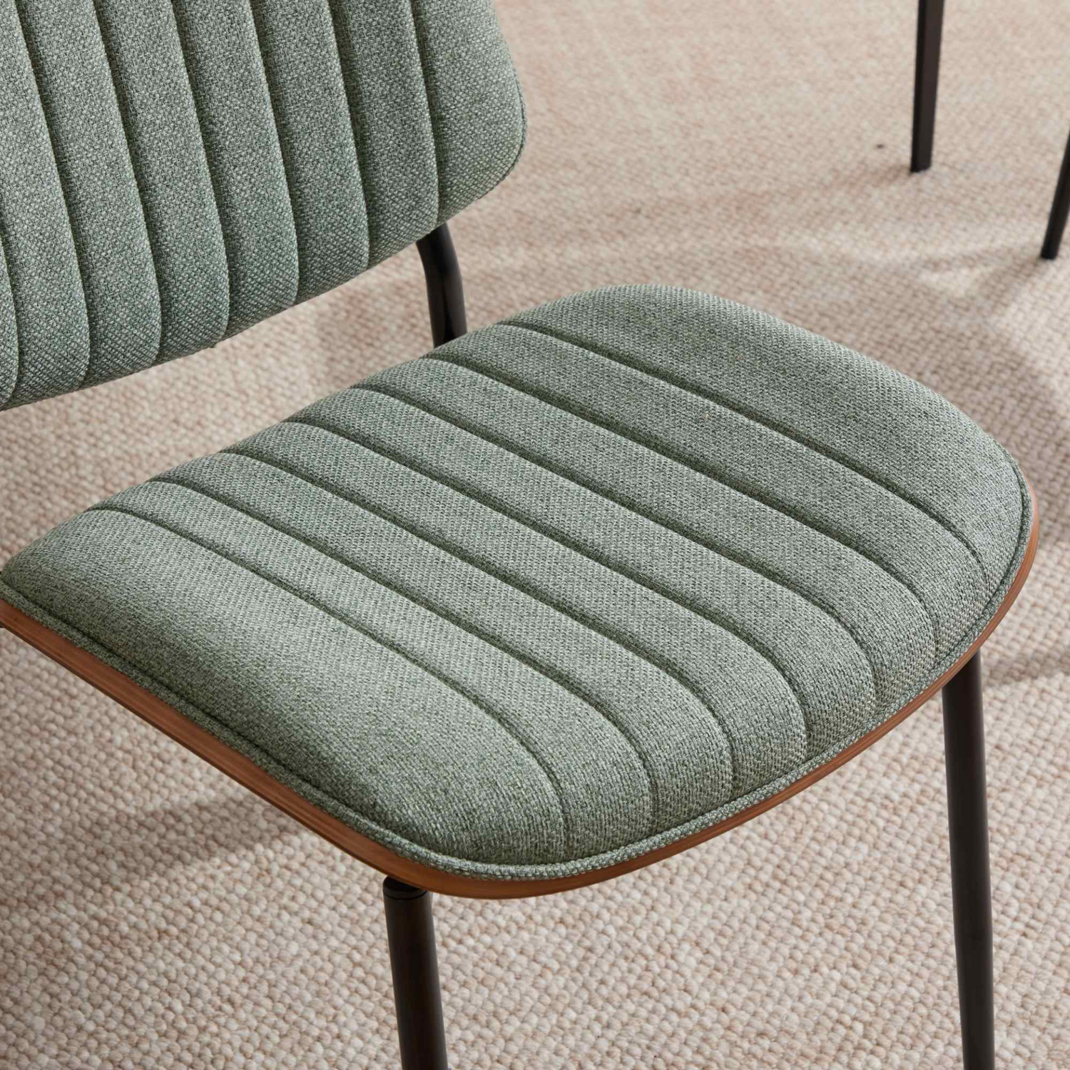 Pair of mid-century modern upholstered dining chairs with walnut bentwood backs, metal legs, and adjustable feet.