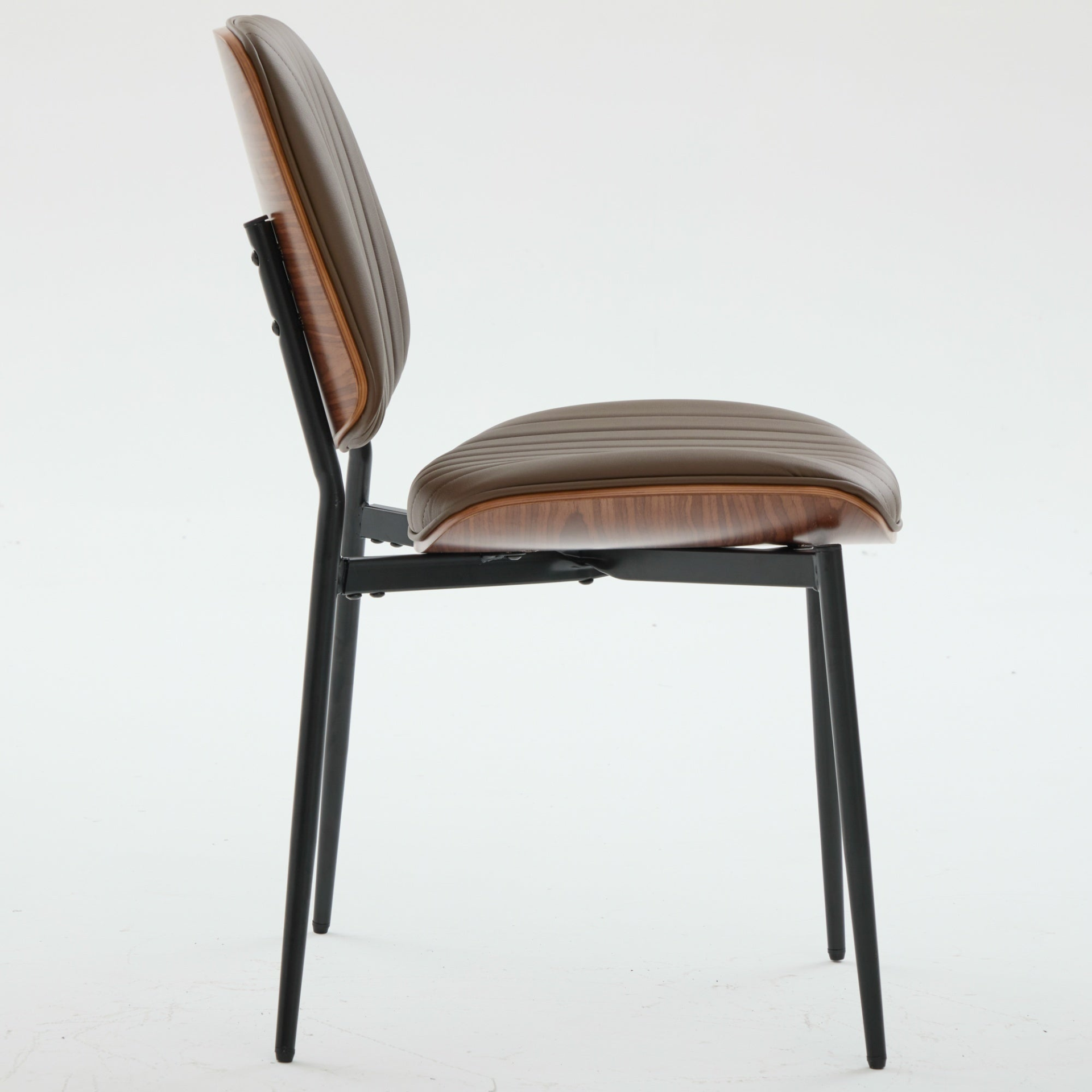Set of 2 Mid Century Modern upholstered dining chairs with walnut bentwood backs, metal legs, and adjustable feet.
