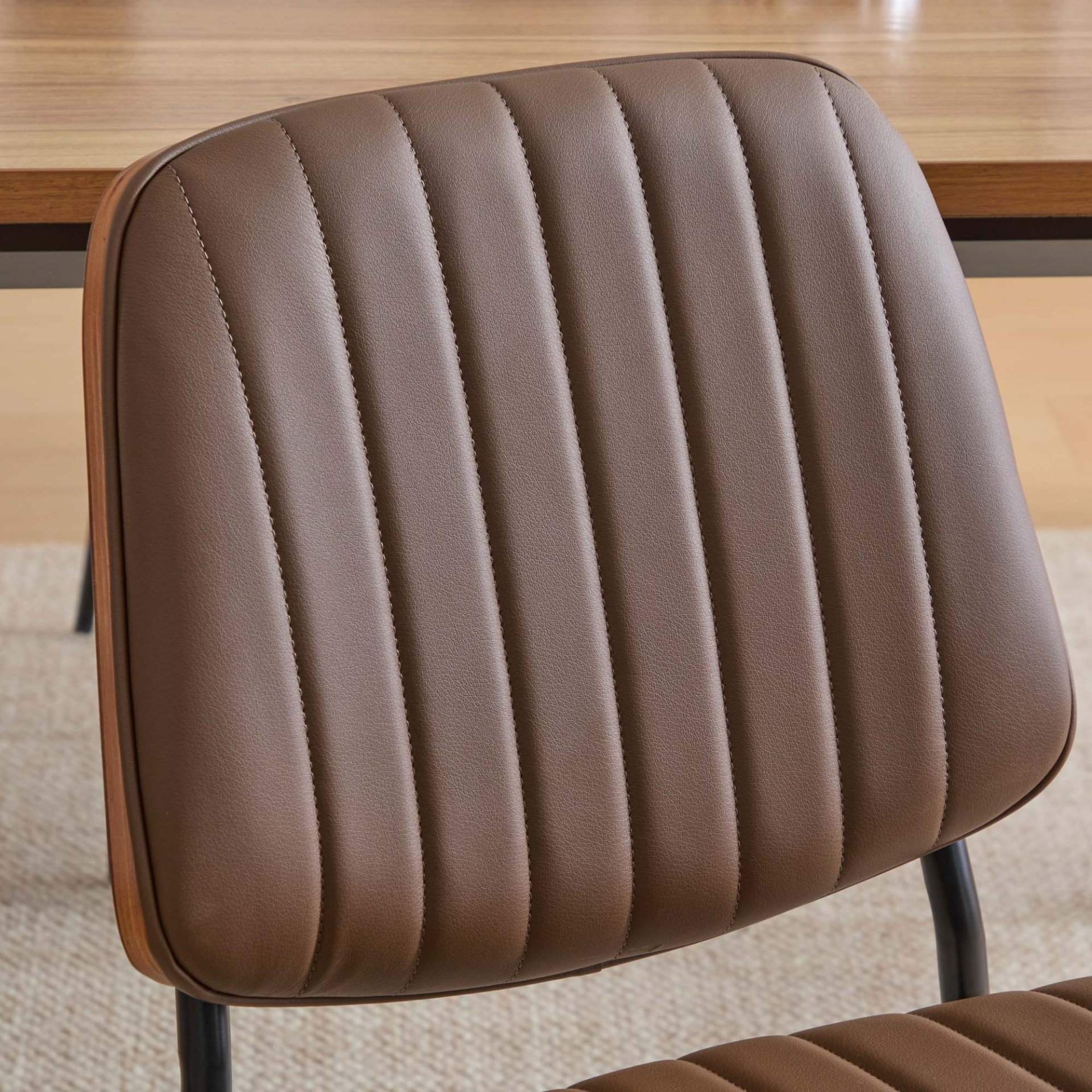 Set of 2 mid-century modern dining chairs with walnut bentwood backs, upholstered seats, metal legs, and adjustable feet.
