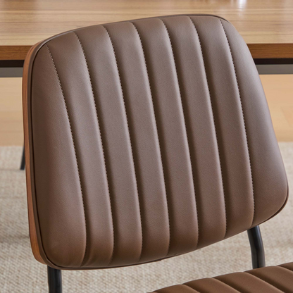 Set of 2 mid-century modern dining chairs with walnut bentwood backs, upholstered seats, metal legs, and adjustable feet.
