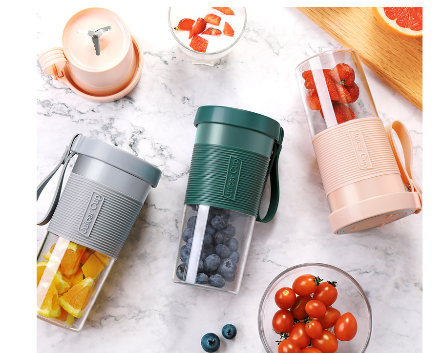 Mini USB rechargeable portable electric fruit juicer by Maroon Asteria, showing compact design and stainless steel blending cup.