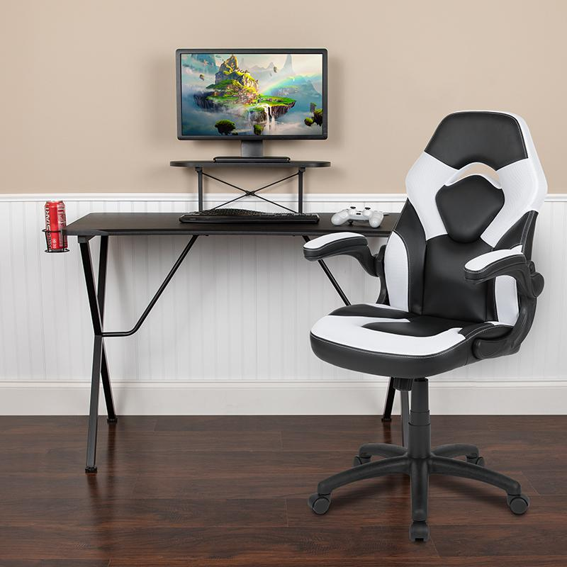 Start2Finish black gaming desk with white and black racing chair set, featuring sleek furniture design and ergonomic gaming setup.