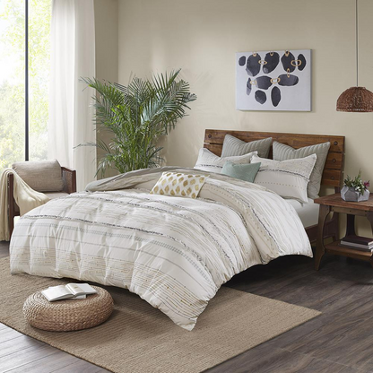 Cotton printed duvet cover set with decorative trims, featuring a stylish design from Start2Finish for a cozy bedroom look.