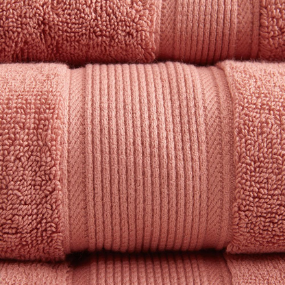 Set of eight white cotton bath towels from Start2Finish, featuring antimicrobial fabric for hygiene and comfort.