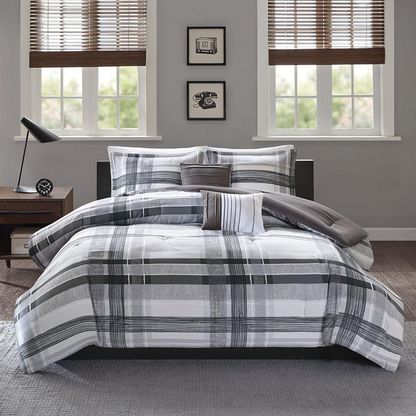 Start2Finish plaid comforter set with a cozy, multicolored checkered pattern on a bed in a well-lit bedroom scene.