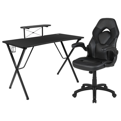 Black gaming desk and racing chair set by Start2Finish, featuring a sleek black furniture design ideal for gaming setups.