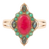 Red onyx and gold cuff bracelet from Start2Finish jewelry, featuring intricate design and polished finish.