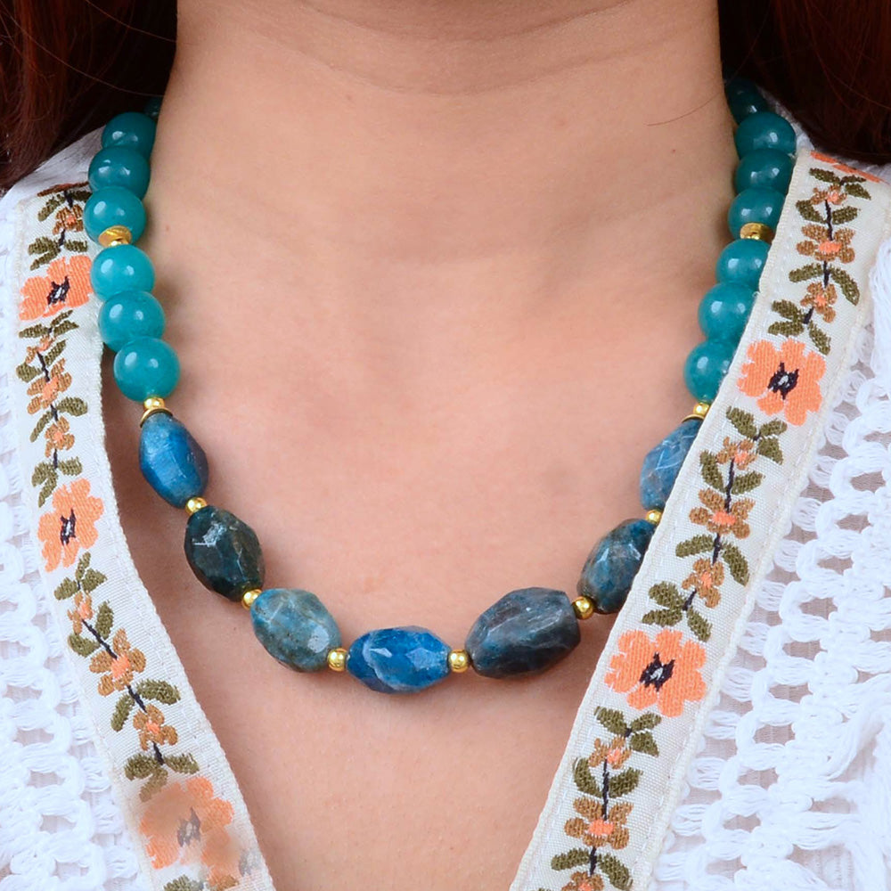 Teal apatite and jade nugget gold necklace featuring natural stone beads on a delicate gold chain.