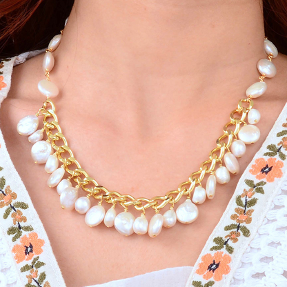 Hepburn white pearl and gold cluster necklace featuring elegant jewelry design with pearl and gold accents.