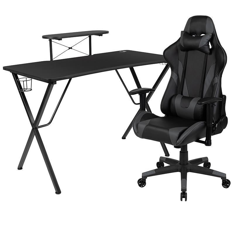 Black gaming desk and gray reclining gaming chair set by Start2Finish, featuring a sleek desk and comfortable ergonomic chair.