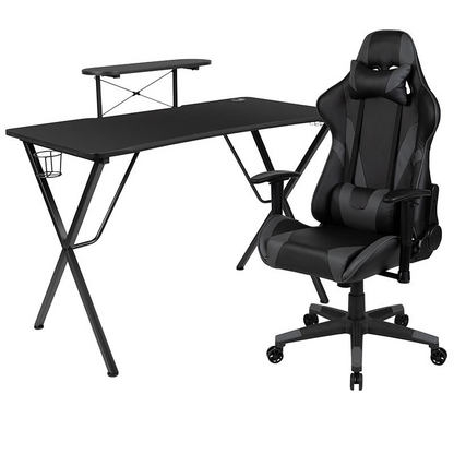 Black gaming desk and gray reclining gaming chair set by Start2Finish, featuring a sleek desk and comfortable ergonomic chair.