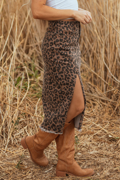 Leopard print denim midi skirt with frayed hem for women, Byzantium Bay brand, styled with casual top and accessories.