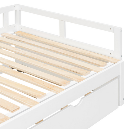 Wooden extending daybed with trundle for space-saving guest sleep, designed by Start2Finish, shown with mattress and bedding.