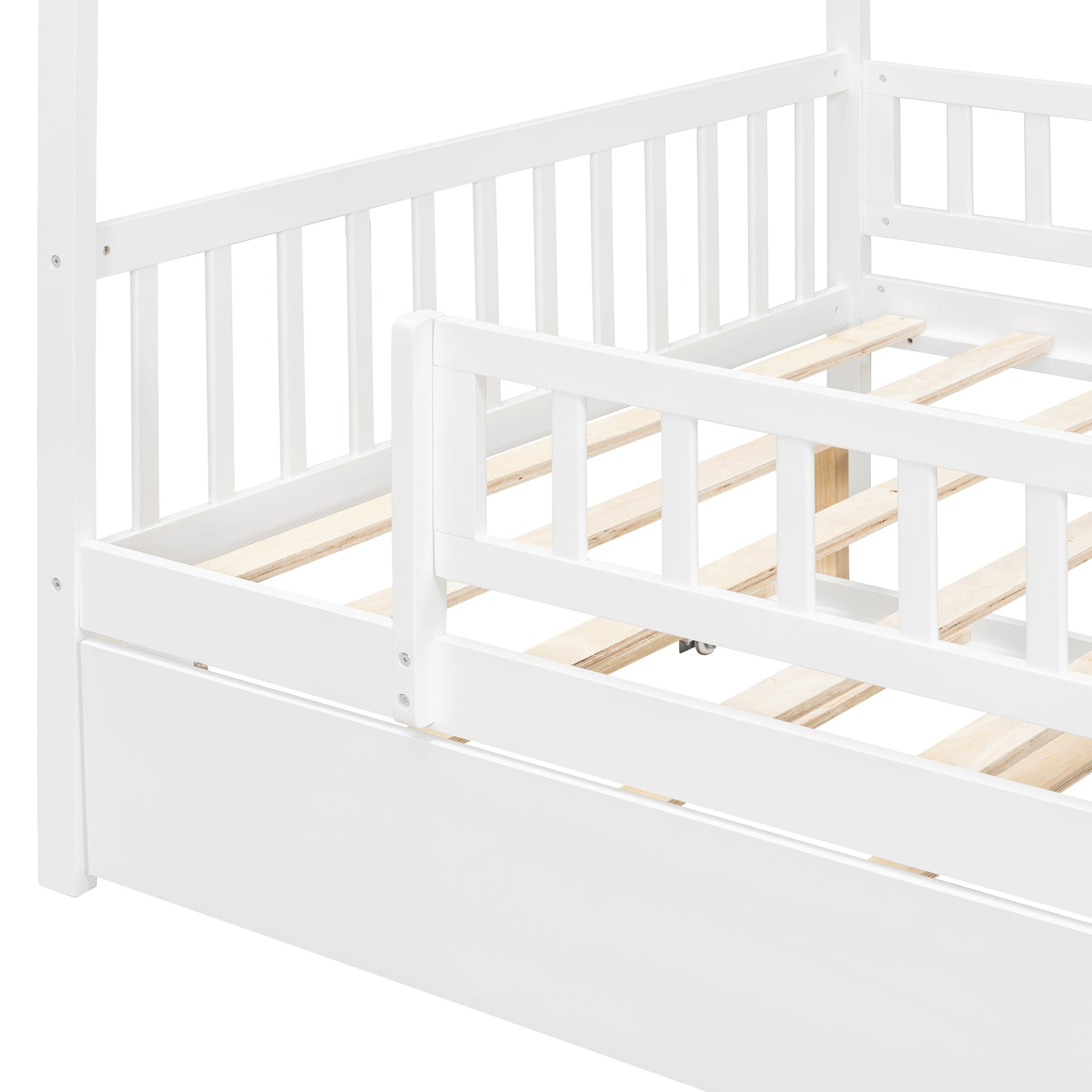 Wooden house-style bed frame with pull-out trundle drawer and slatted support, by Start2Finish, shown with mattress and bedding