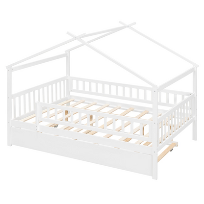 Wooden house-style bed frame with pull-out trundle drawer and slatted support, by Start2Finish, shown with bedding and pillows.