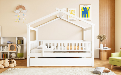 Wooden house-style bed frame with pull-out trundle drawer and slatted support, by Start2Finish, shown with mattress and bedding.