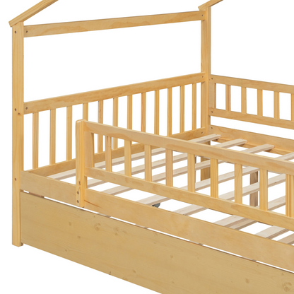 Wooden house-style bed frame with pull-out trundle drawer and slatted support, by Start2Finish, shown with mattress and bedding.