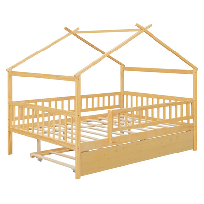 Wooden house-style bed frame with pull-out trundle drawer and slatted support, by Start2Finish, shown in a cozy bedroom setting.