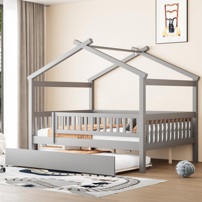 Wooden house-style bed frame with pull-out trundle drawer and slatted support, by Start2Finish, shown in a cozy bedroom setting.