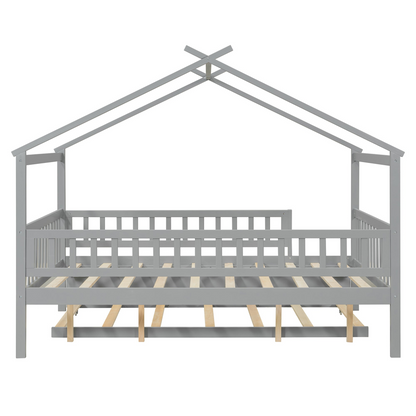 Wooden house-style bed frame with pull-out trundle drawer and slatted support, by Start2Finish, shown in natural wood finish.