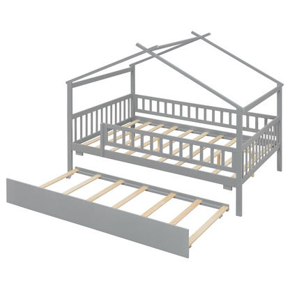 Wooden house-style bed frame with pull-out trundle drawer and slatted support, by Start2Finish, shown with mattress and bedding.