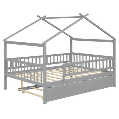 Wooden house-style bed frame with pull-out trundle drawer and slatted support, by Start2Finish, shown with mattress and bedding