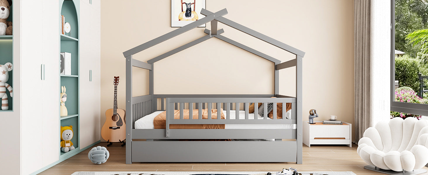 Wooden house-style bed frame with pull-out trundle drawer and slatted support by Start2Finish, showcasing a sturdy, cozy bedroom setup.