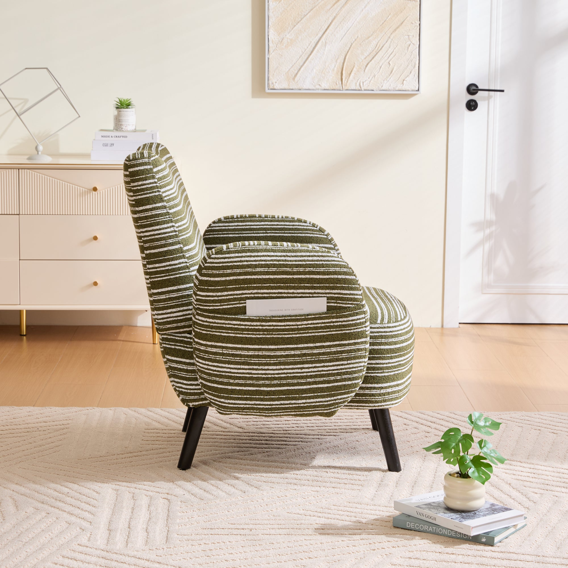 Modern armchair with sanded fabric, solid wood legs, and side storage pocket by Start2Finish, shown with plush cushioning and stylish design.