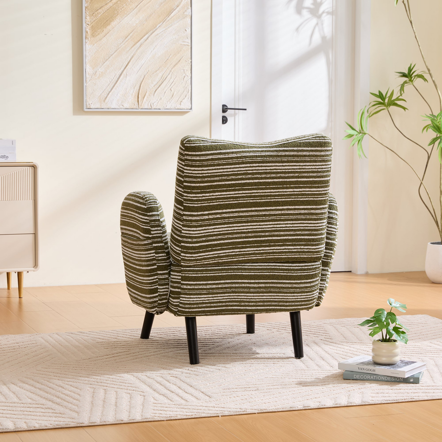 Modern armchair with sanded fabric, solid wood legs, and side storage pocket, by Start2Finish.
