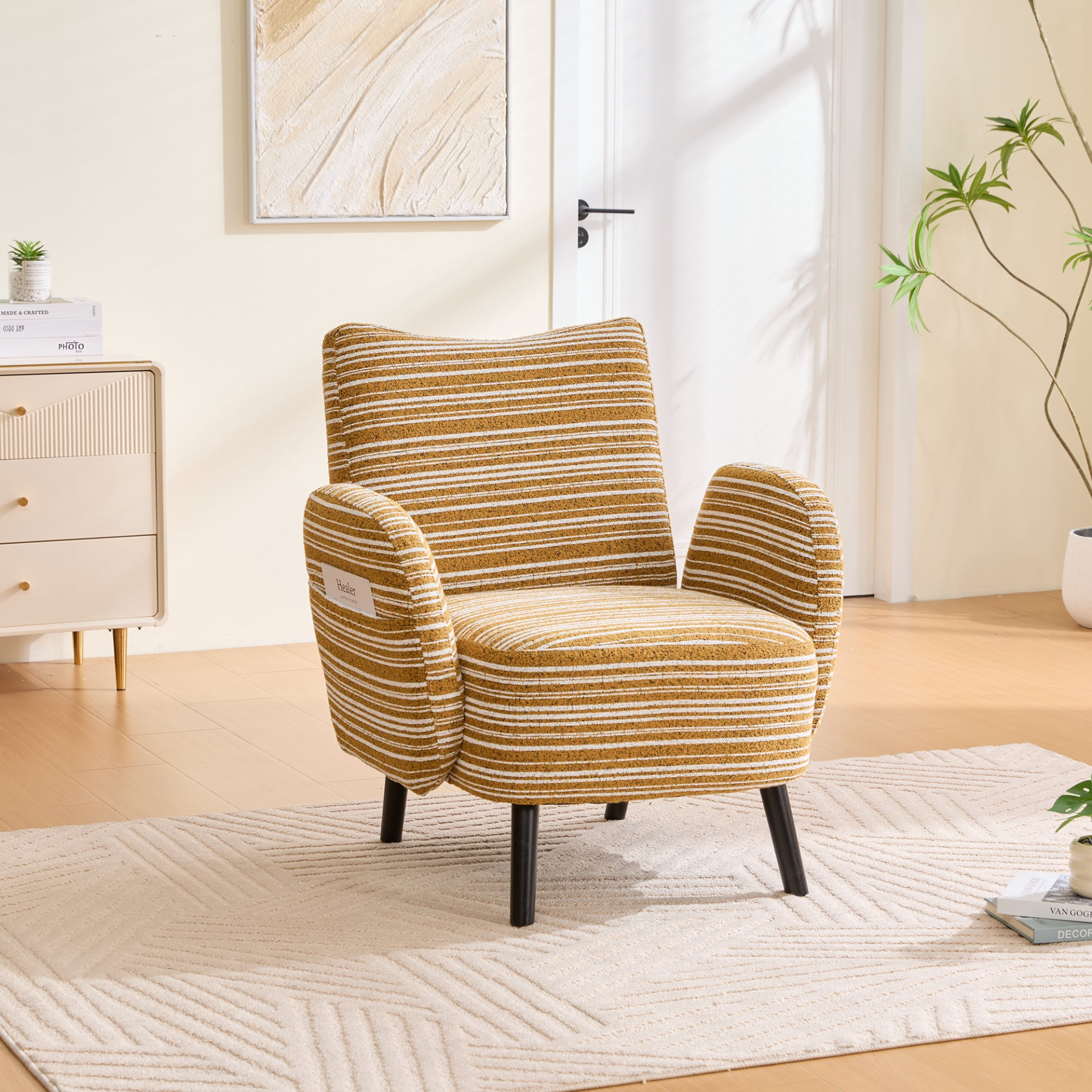 Modern armchair with sanded fabric, side storage pocket, and solid wood legs by Start2Finish, shown with a cozy, inviting design