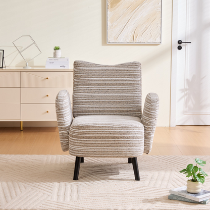 Modern armchair with sanded fabric, side storage pocket, and solid wood legs from Start2Finish, shown in a cozy living space.