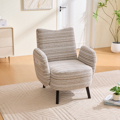 Modern armchair with sanded fabric, side storage pocket, and solid wood legs by Start2Finish, shown in a stylish living room setting.