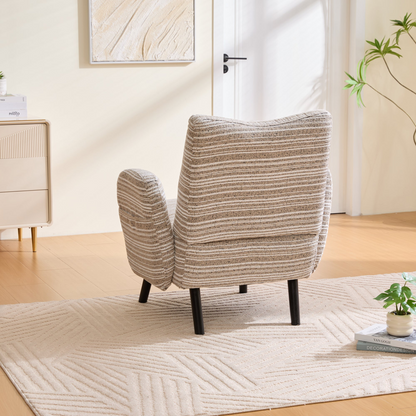 Modern armchair with sanded fabric, solid wood legs, and side storage pocket by Start2Finish, shown in a cozy living room setting.
