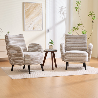 Modern armchair by Start2Finish with sanded fabric, side storage pocket, and solid wood legs in a stylish living room setting.