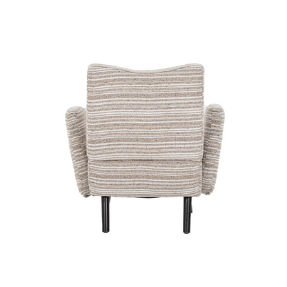 Modern armchair by Start2Finish with sanded fabric, side storage pocket, and solid wood legs, shown in a stylish living room setting.