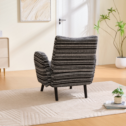 Modern Start2Finish armchair with sanded fabric, side storage pocket, and solid wood legs in a stylish living room setting.