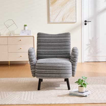 Modern armchair with sanded fabric, solid wood legs, and a side storage pocket, by Start2Finish.