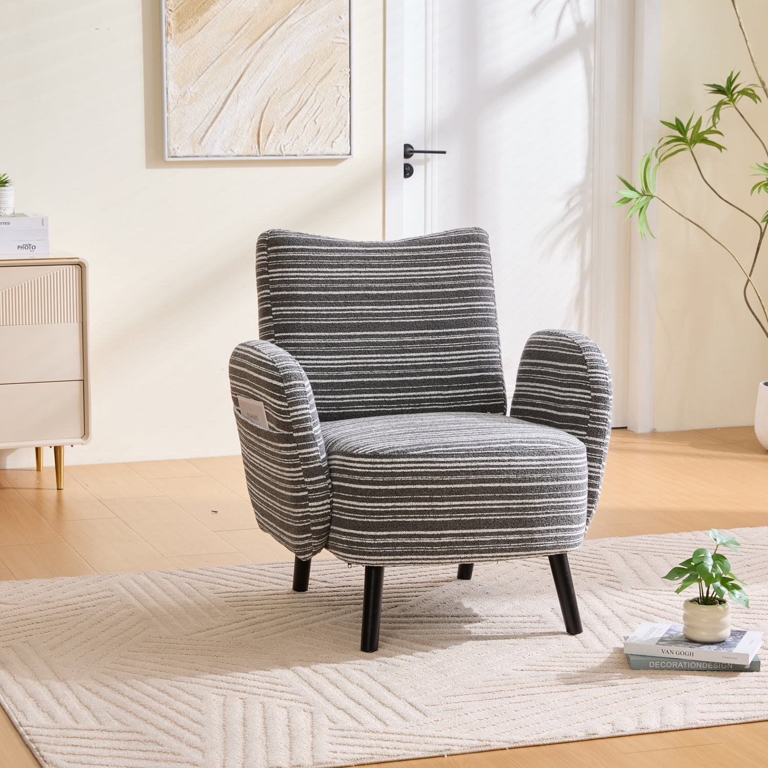 Modern armchair by Start2Finish with sanded fabric, side storage pocket, and solid wood legs, perfect for contemporary living spaces.