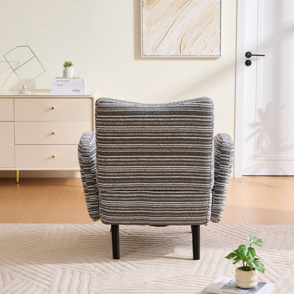 Modern armchair with sanded fabric, solid wood legs, and side storage pocket, showcasing a stylish and comfortable design.