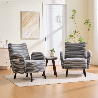 Modern armchair by Start2Finish with sanded fabric, side storage pocket, and solid wood legs, shown from a front angle.