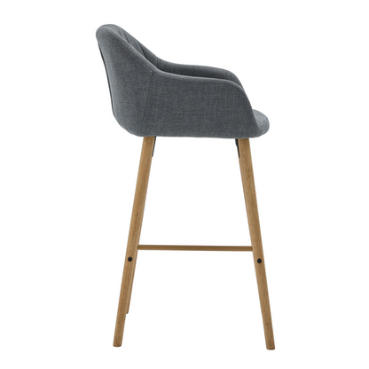 Modern linen upholstered bar stool with back, armrests, footrest, and solid wood legs from Start2Finish furniture.