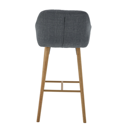 Modern linen upholstered bar stool with back, armrests, footrest, and solid wood legs from Start2Finish furniture.