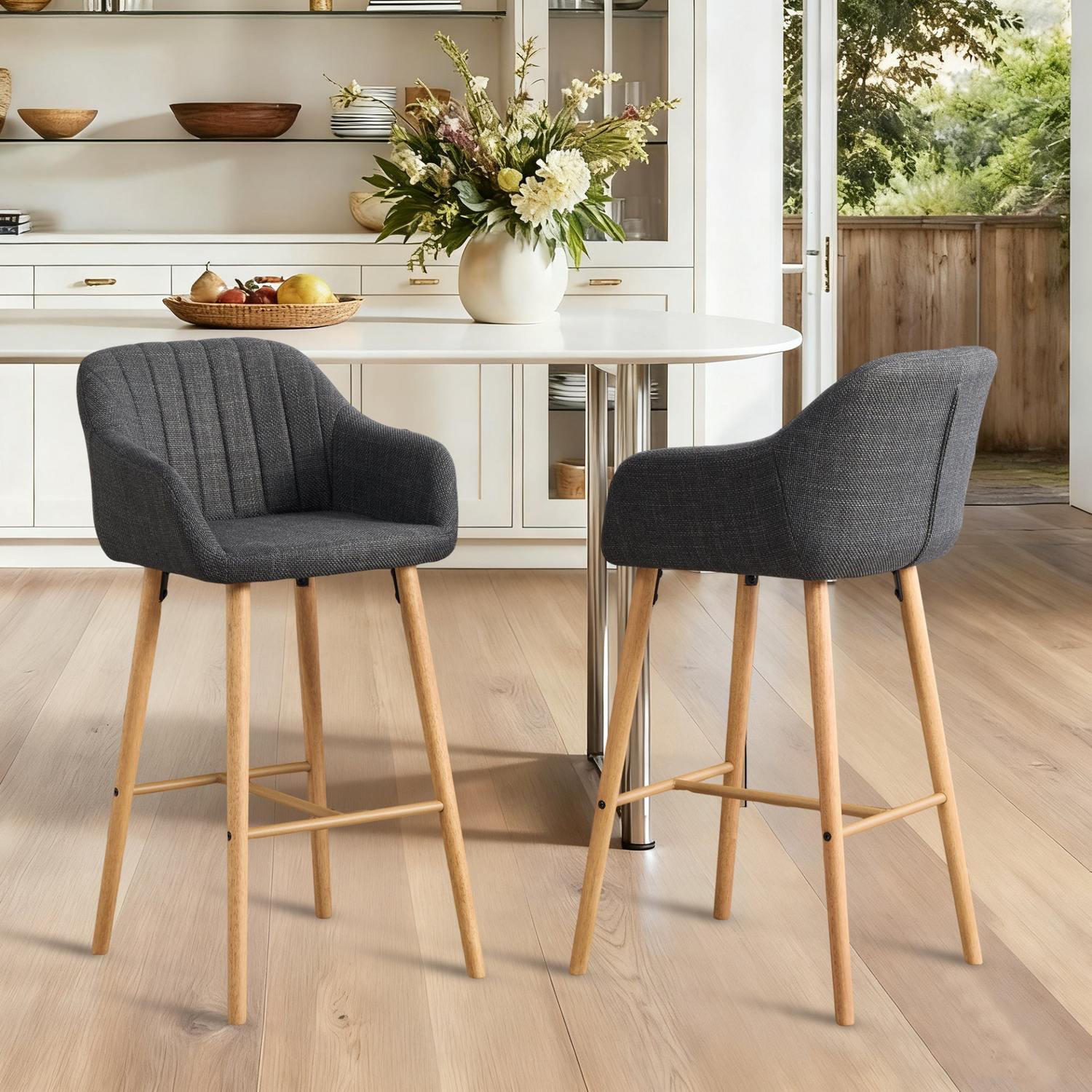 Modern linen upholstered bar stool with back, armrests, footrest, and solid wood legs, by Start2Finish furniture.