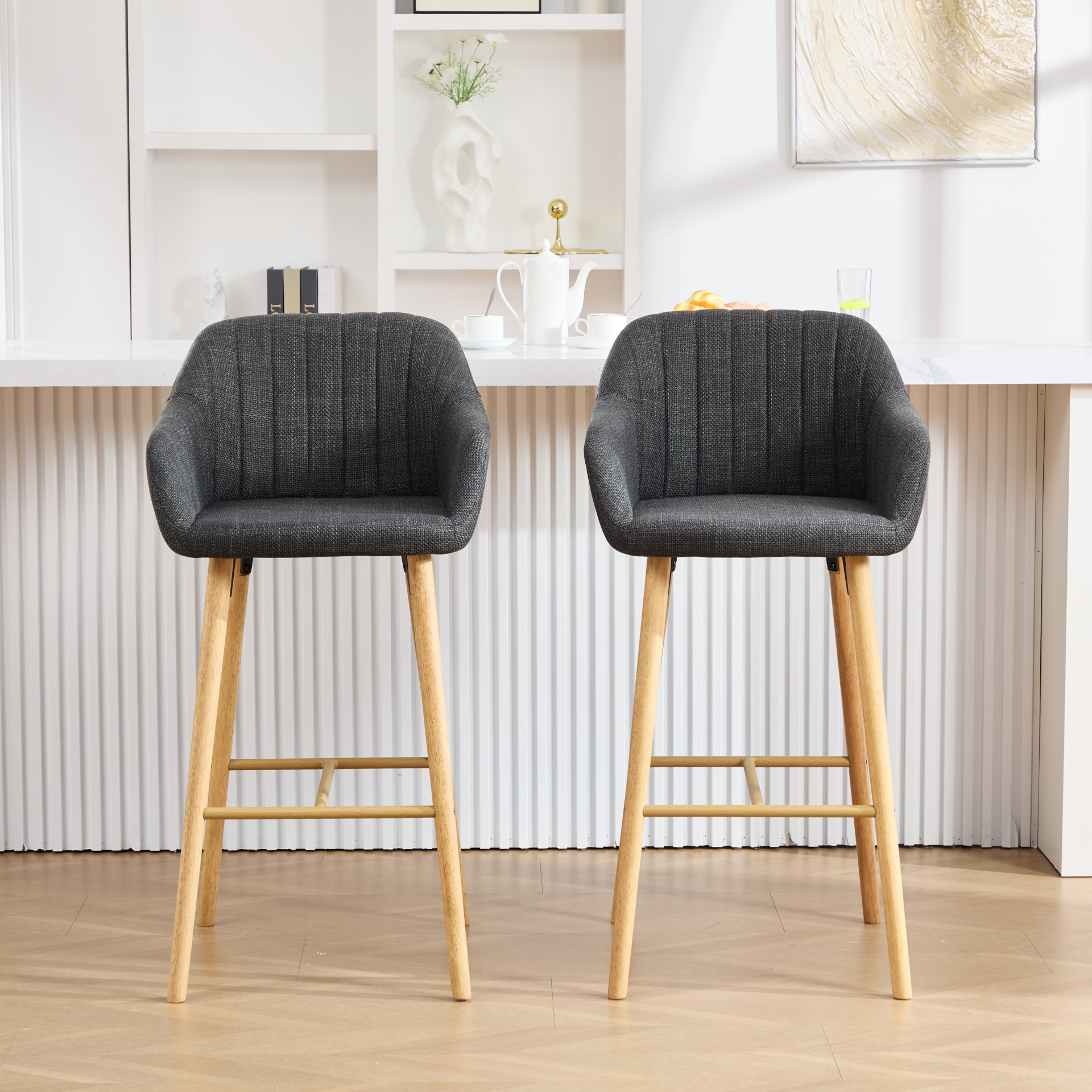 Modern linen upholstered bar stool with back, armrests, footrest, and solid wood legs from Start2Finish furniture collection.