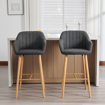 Modern linen upholstered bar stool with back, armrests, footrest, and solid wood legs from Start2Finish furniture.
