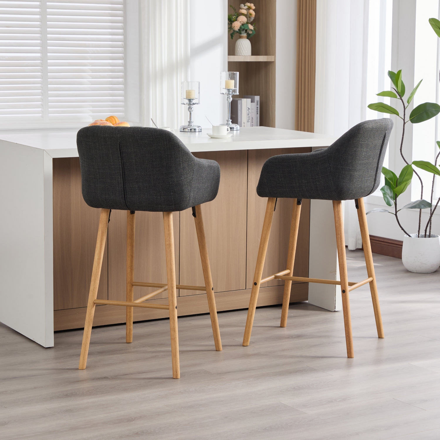 Modern linen upholstered bar stool with back, armrests, footrest, and solid wood legs from Start2Finish furniture.