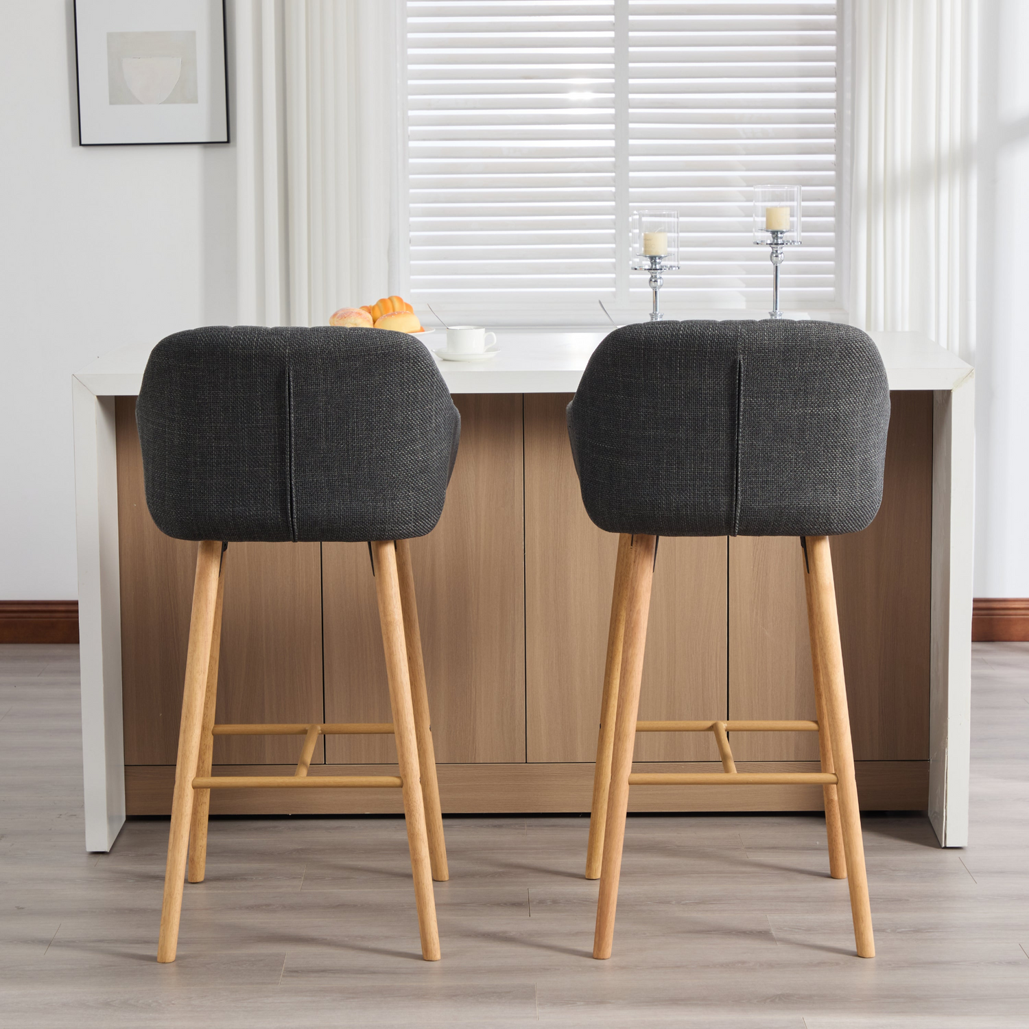 Modern linen upholstered bar stool by Start2Finish featuring a backrest, armrests, footrest, and solid wood legs.
