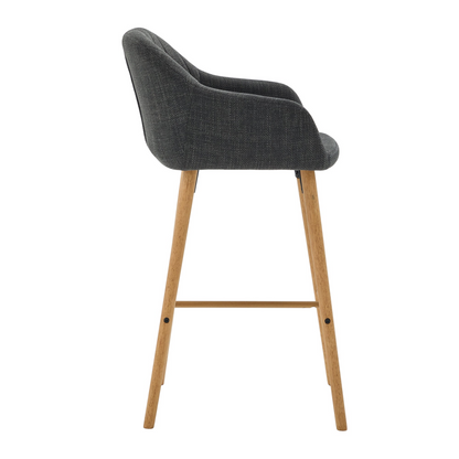 Modern linen upholstered bar stool with back, armrests, footrest, and solid wood legs from Start2Finish furniture.