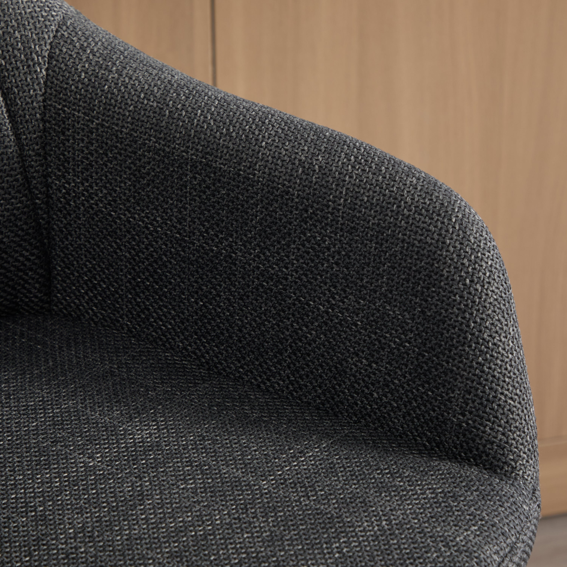 Modern linen upholstered bar stool with back, armrests, footrest, and solid wood legs from Start2Finish furniture.