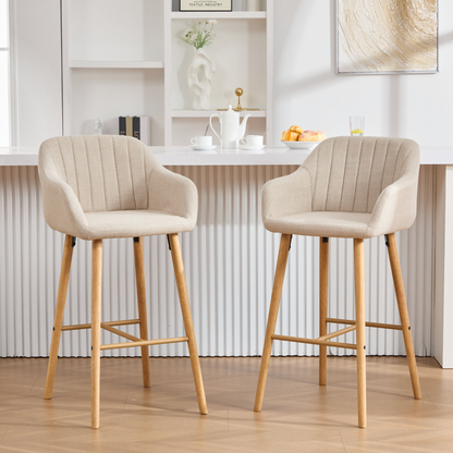 Modern linen upholstered bar stool with backrest, armrests, footrest, and solid wood legs from Start2Finish furniture collection.